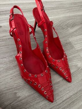 SCHUTZ Red Patent Pointed Slingback Pumps with Eyelet Lacing